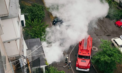 Smoke coming out of apartment building